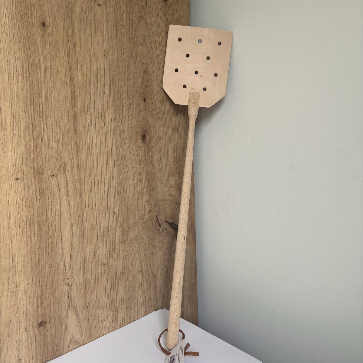 Tapette à mouche en cuir